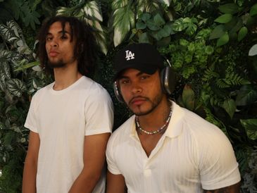 Jorge&Julius our super good-looking human model waring wearing our super fit T-shirt.