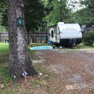 Beautiful, shady Rv space with plenty of elbow room.