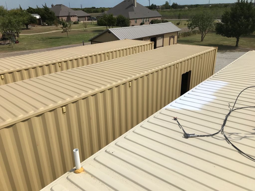 Spraying Thermal Barrier to Shipping Container Home