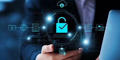 Businessman holding phone with digital cybersecurity lock icons.