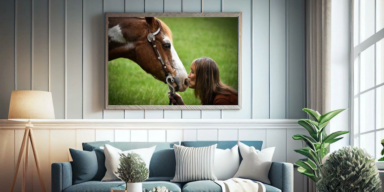 living room with a large framed picture of a woman kissing the nose of a horse