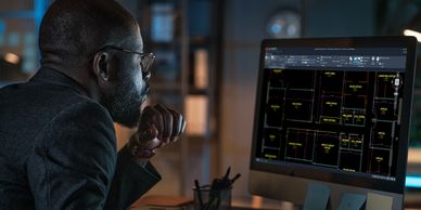 person viewing a DWG AutoCAD drawing on computer 