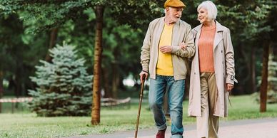 Elder couple takes a reviving walk