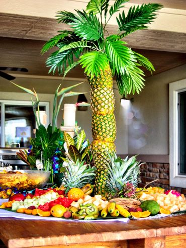Tropical Fruit Display with Carved Pineapple Palm Tree | Luau-Themed Denver Catering