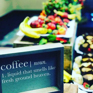 Coffee and fresh fruit display at a Denver corporate breakfast catered by Silver Spoons Catering