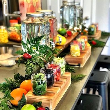Infused water bar with fresh fruit and herbs – perfect for Denver brunch or celebration catering