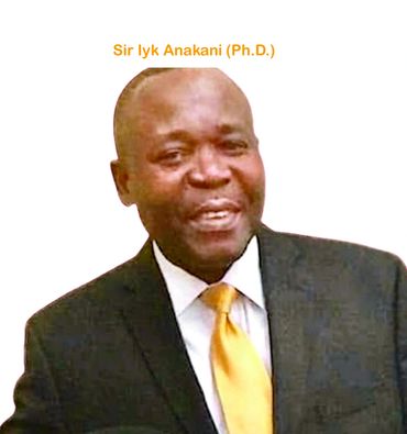 Portrait of Sir Iyk Anakani in a suit with a yellow tie.