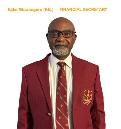 Portrait of a man in a maroon blazer and striped tie.