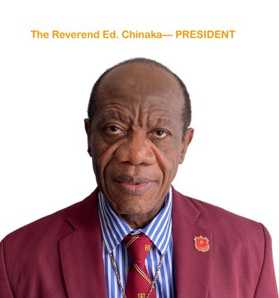 Portrait of The Reverend Ed. Chinaka, President, in formal attire.