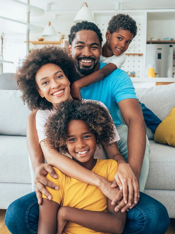 Happy family smiling and spending time with each other