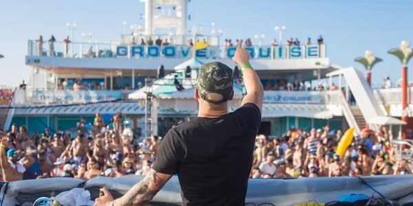 DJ poolside on Groove Cruise