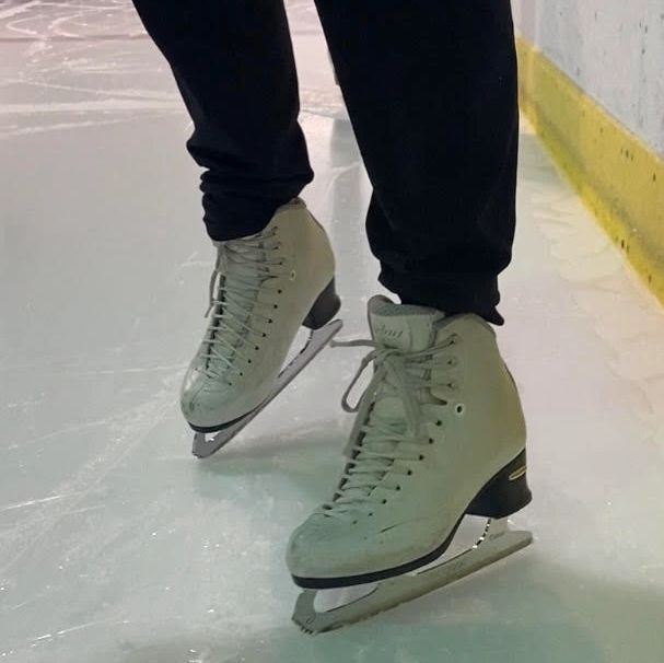 Jessica Rensch's ice skates on ice.