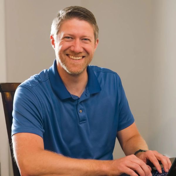 single person smiling looking directly at you. 