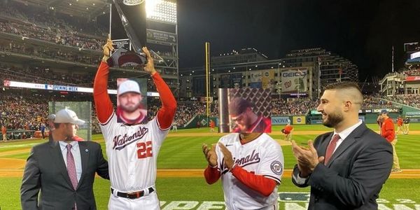 Shoop receiving his award, while HOF, Golden Glove, and ROY painfully watch
