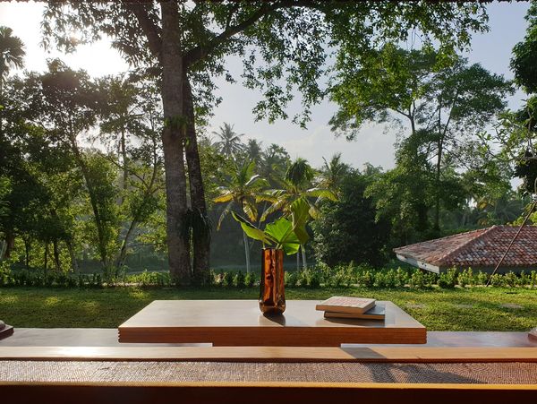 The main porch is a wonderful place to relax and reconnect with loved ones or nature.