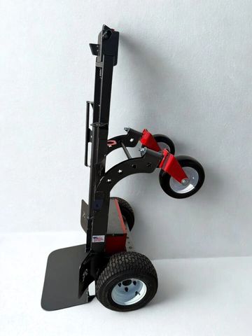 Heavy-duty hand truck with large wheels and red swivel casters.