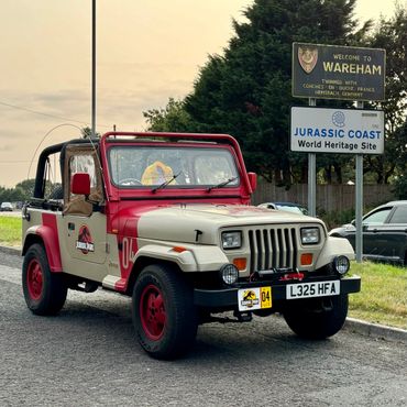 JP04 Jurassic Park Jeep parked by Wareham Jurassic Coast sign