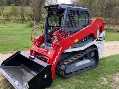 Skid loader bucket gravel driveways 