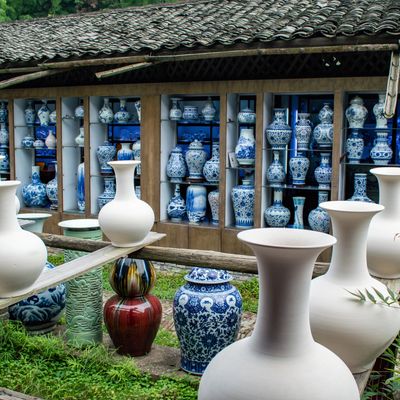 White and blue ceramic pots on the display of the website