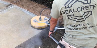 Heated surface cleaning to remove black organic debris and tire markings