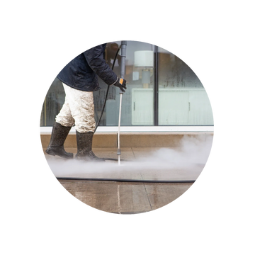 Man power washing patio, driveway, sidewalk, side of house, power wash exterior of house 