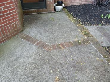 A before picture of a dirty patio.