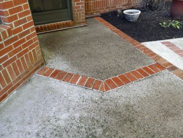 An after picture of a freshly pressure washed patio.