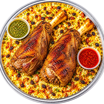 Grilled lamb shanks on seasoned rice with sauces.