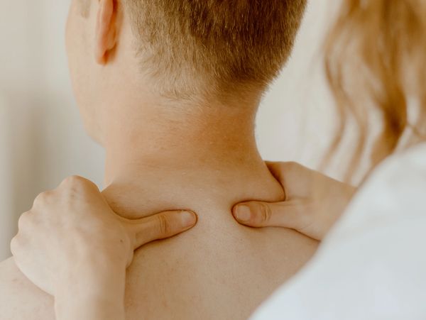 Neck pain and whiplash treatment with osteopath and physiotherapist 
