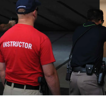 Police firearms training with an instructor supervising officers at a shooting range.