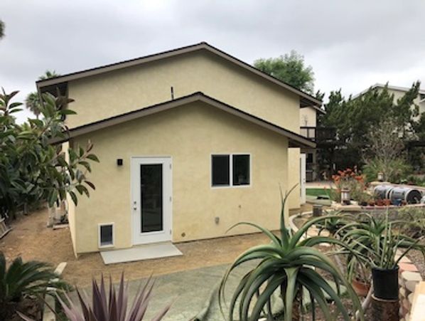 Accessory dwelling unit ADU in rear yard of residence with custom loft area