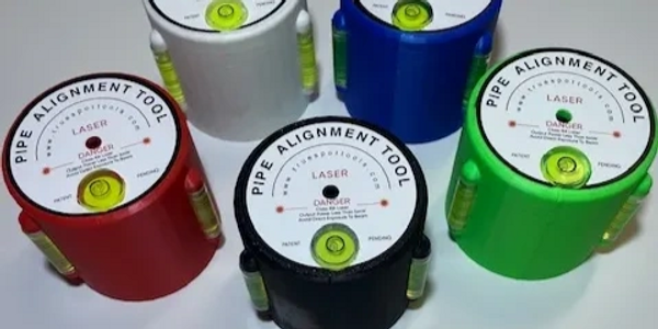 Colorful pipe alignment tools with built-in laser and bubble levels.