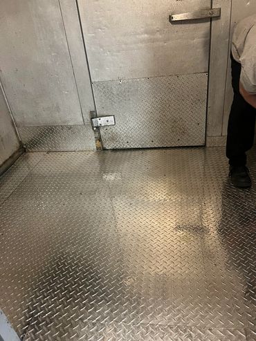 Custom 3003 H22 aluminum diamond plate floor replacement for a commercial kitchen in Tampa.