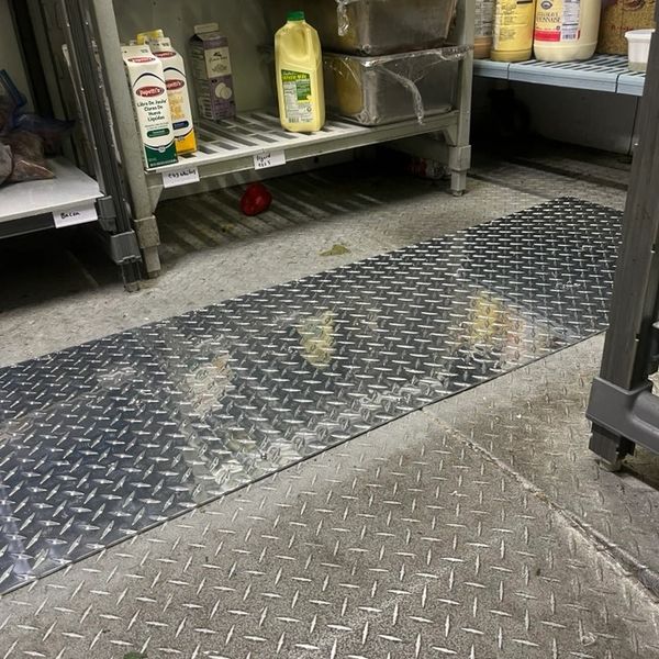Structural walk-in cooler floor repair in Clearwater using an 8-foot piece of 3003 H22 aluminum 