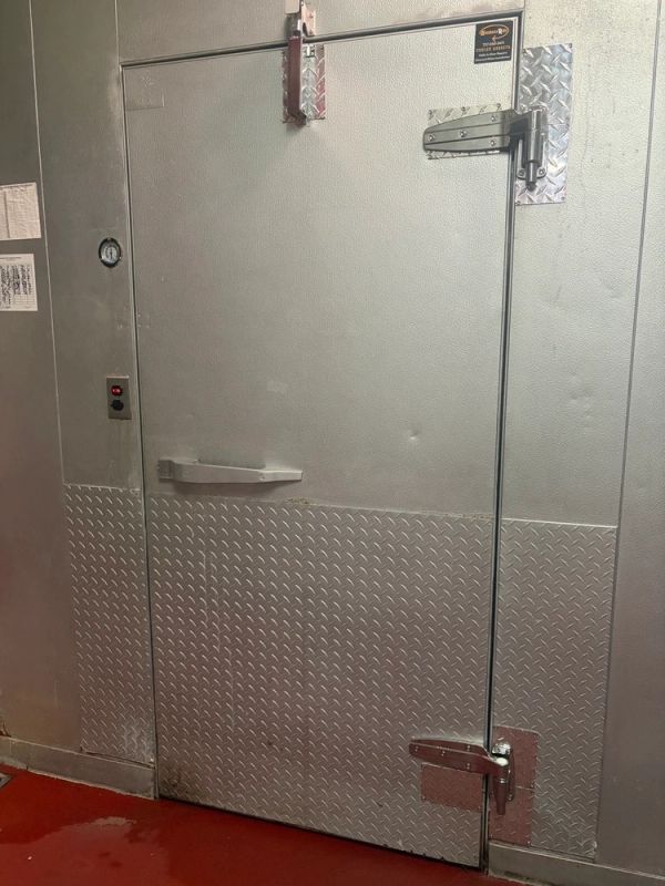 Fully rebuilt commercial walk-in refrigerator door featuring heavy-duty Kason hardware, new gaskets,