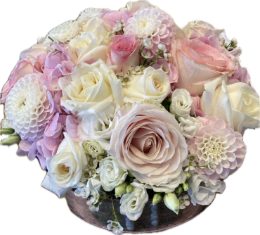 Bouquet of mixed white and pink flowers.