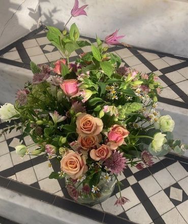 Beautiful mixed flower bouquet in a glass vase