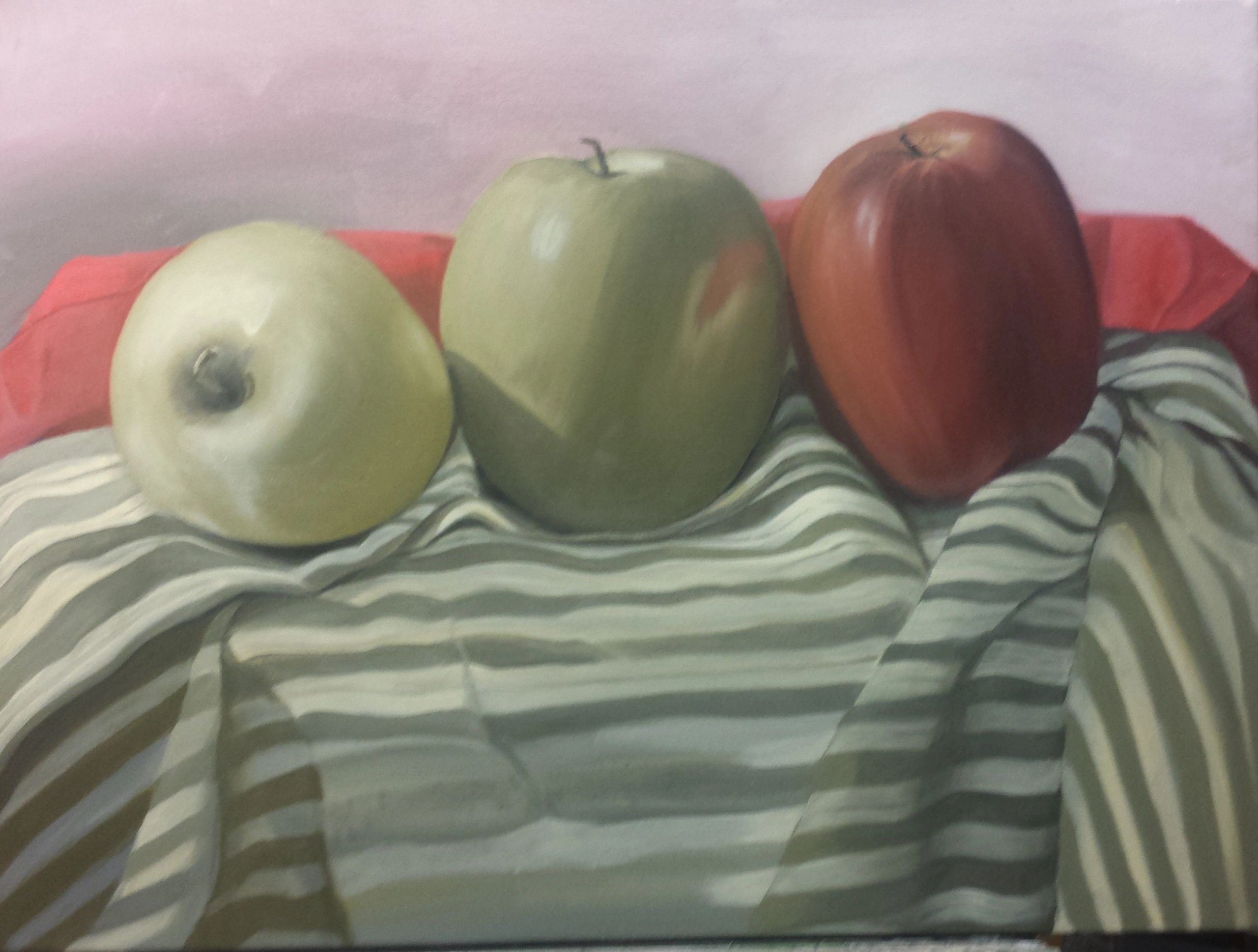 Still life with three apples--a study in reds and greens
