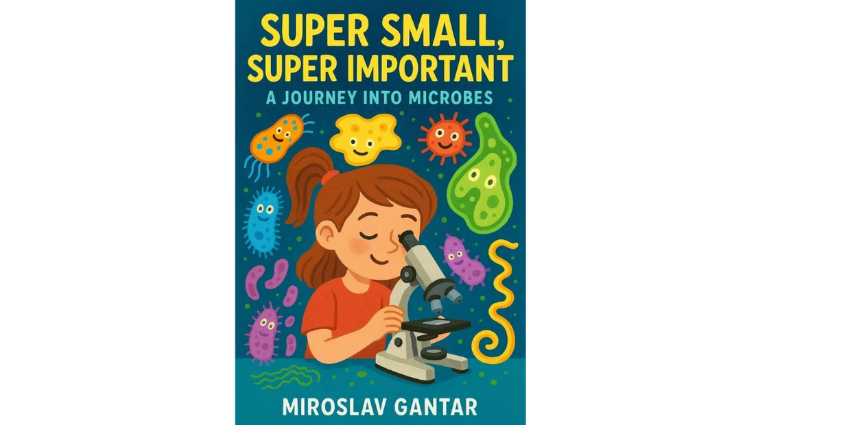 A young girl looking through the microscope