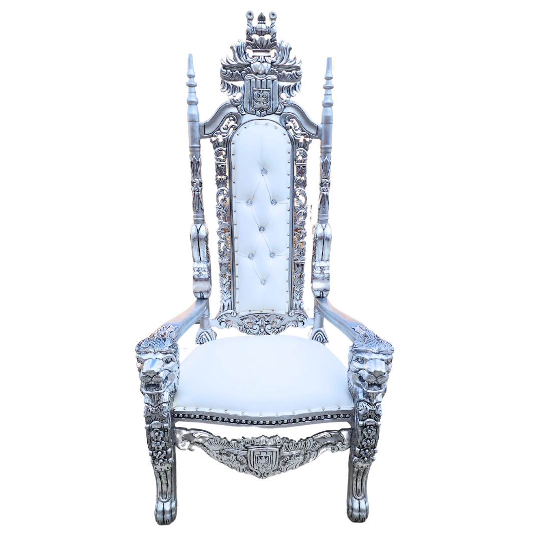 White and silver lion-head throne with tall backrest, crystal tufting, and intricate carvings on a black background.

