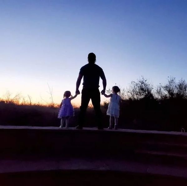 America's Garage Henderson Auto Repair Brice & girls with evening sunset