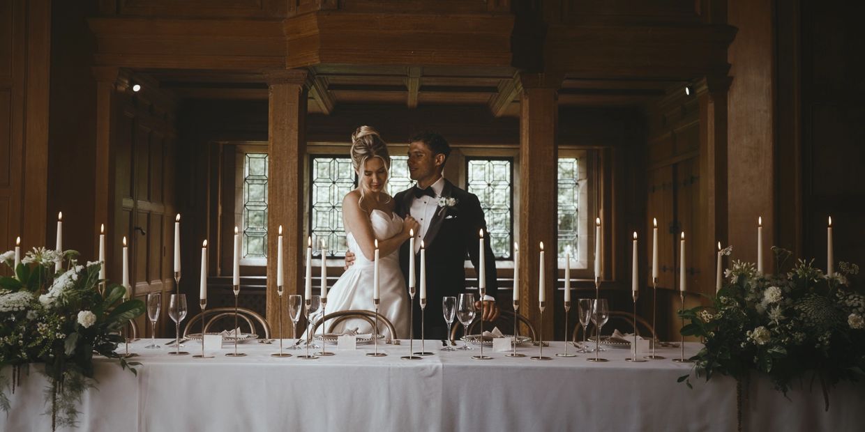 Luxury wedding decor with an abundance of candles at Balcombe place in WEst Sussex