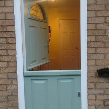 Chartwell Green Solid Core composite Stable door fitted in Nottingham by Mansfield Front Doors.