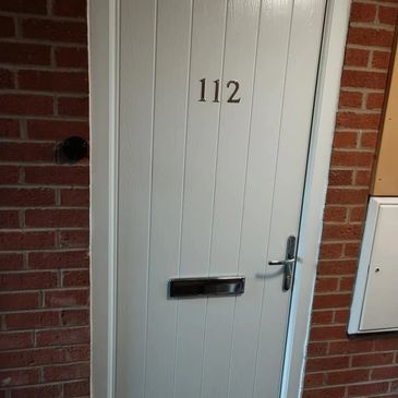 Cottage style FD30 Composite Fire Door   in white fitted in Forest Town by our trained installers.