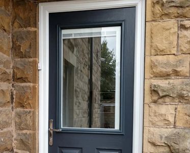 Mansfield Front Doors fitted this Anthracite Grey Solid Core composite door with integrated blinds.