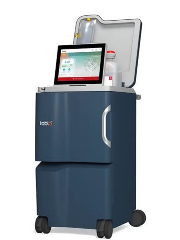 Medical device with touchscreen and wheels.