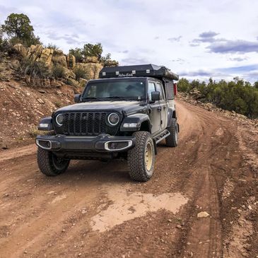 Jeep Gladiator with Alu-cab Canopy Camper on the Rimrocker Trail.