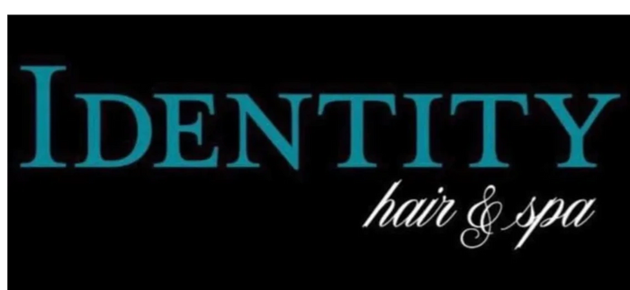 Logo for Identity Hair & Spa in blue and white text on black background.