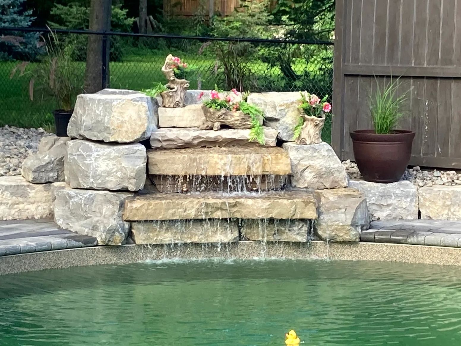 Natural armor stone waterfall installation in Simcoe County