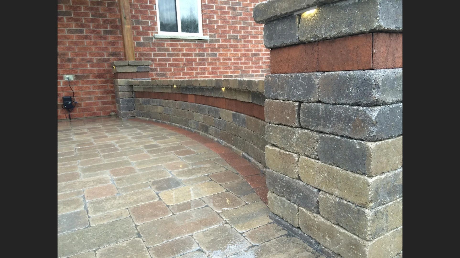 Segmental retaining wall installation in Simcoe County Ontario